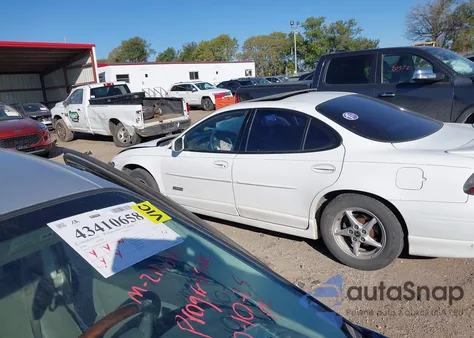 2000 Pontiac Grand Prix Gtp z USA, uszkodzony, nr VIN 1G2WR5217YF125528
